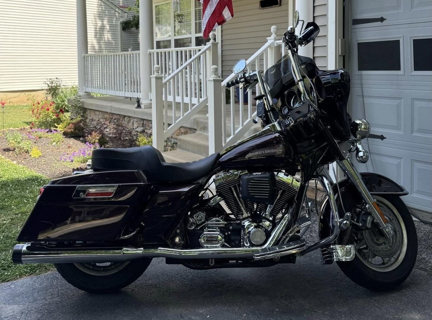 Harley-Davidson bagger parked outside the shop