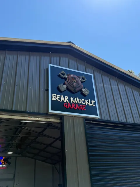 Bear Knuckle Garage sign mounted