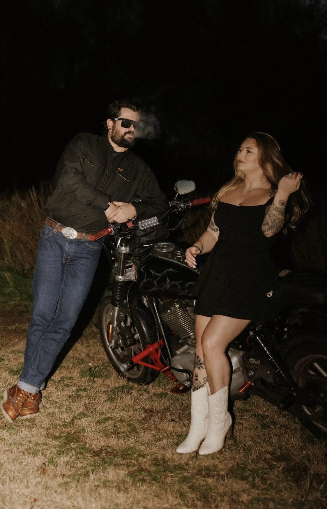 Alex with a partner on a custom bike